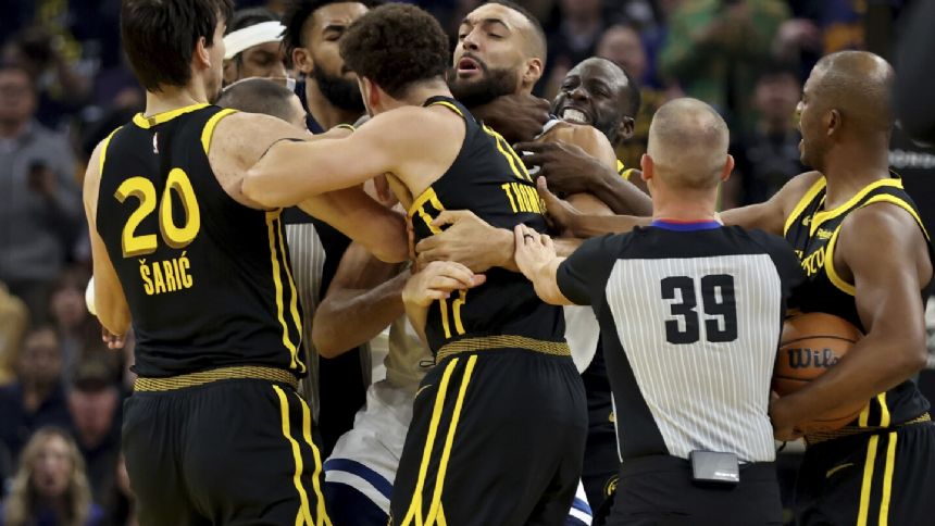 Warriors' Draymond Green suspended 5 games for grabbing Rudy Gobert; 3 players fined