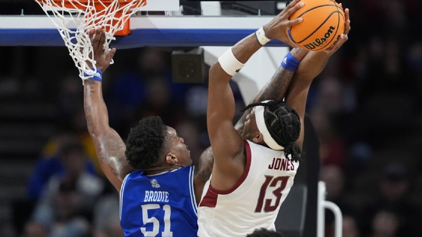 Washington State survives maddening 2nd half to beat Drake 66-61 in March Madness