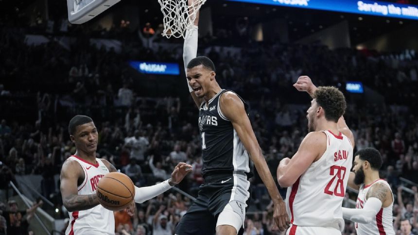 Wembanyama makes tying basket in regulation, then earns his first NBA win as Spurs top Rockets in OT