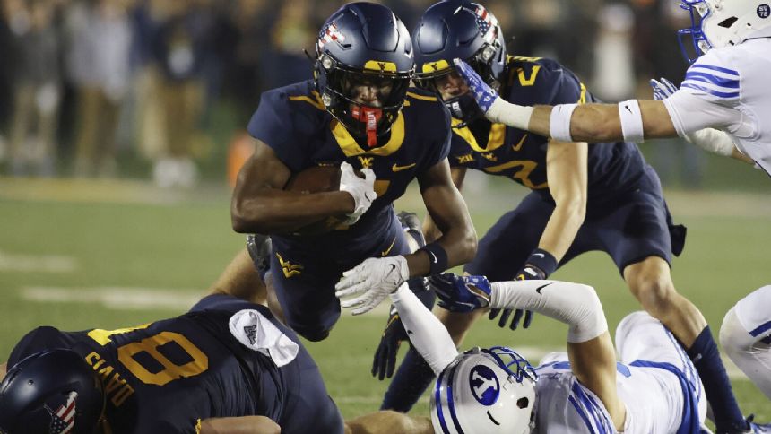 West Virginia gets strong rushing efforts from Jahiem White and CJ Donaldson in a 37-7 win over BYU