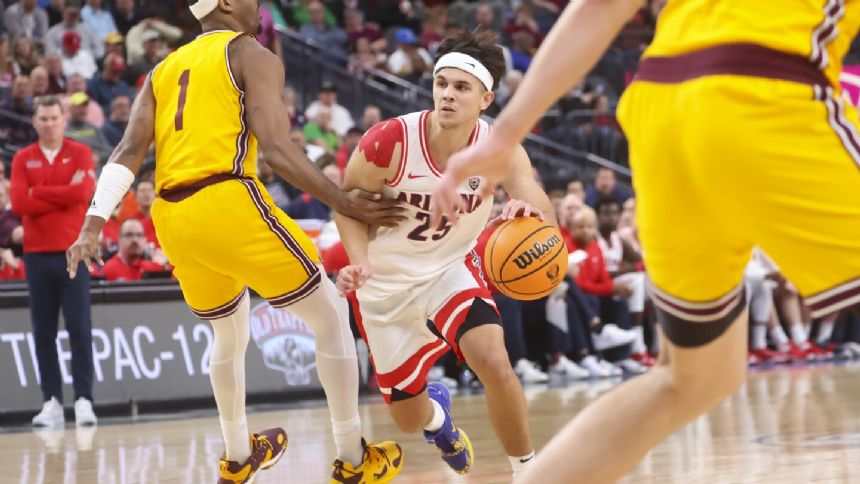 West Virginia's Kerr Kriisa suspended 9 games for receiving impermissible benefits at Arizona