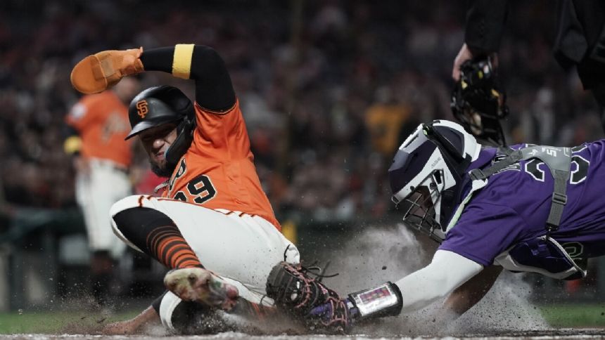 Wilmer Flores draws bases-loaded walk for go-ahead run, Giants come back twice to beat Rockies 9-8