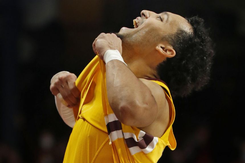 With 3 starters out, Gophers beat Scarlet Knights 68-65