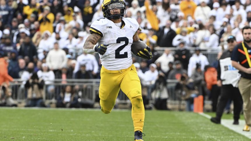 Without Jim Harbaugh, No. 2 Michigan grinds past No. 9 Penn State with 32 straight runs in 24-15 win