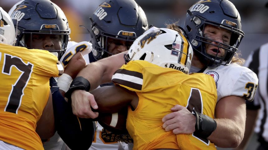 Wyoming sends coach Bohl into retirement as a winner with 16-15 win over Toledo in Arizona Bowl