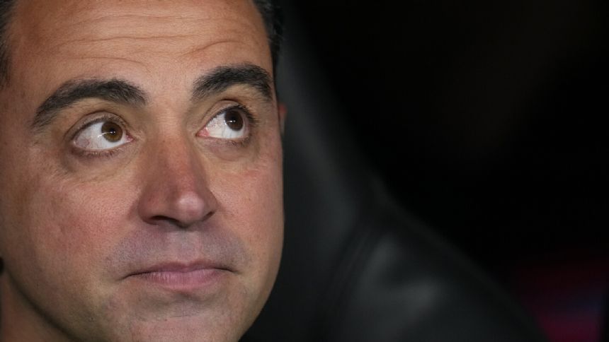 Xavi says Barcelona's improved play has been key to changing his mind to leave the club