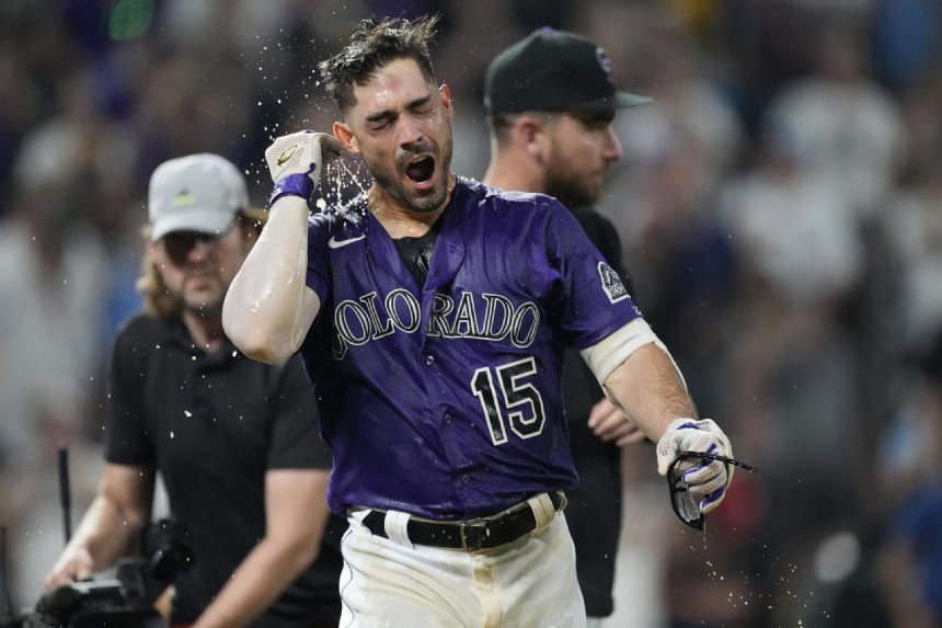 Yelich 499-foot HR for Brews, but Grichuk, Rockies win in 10