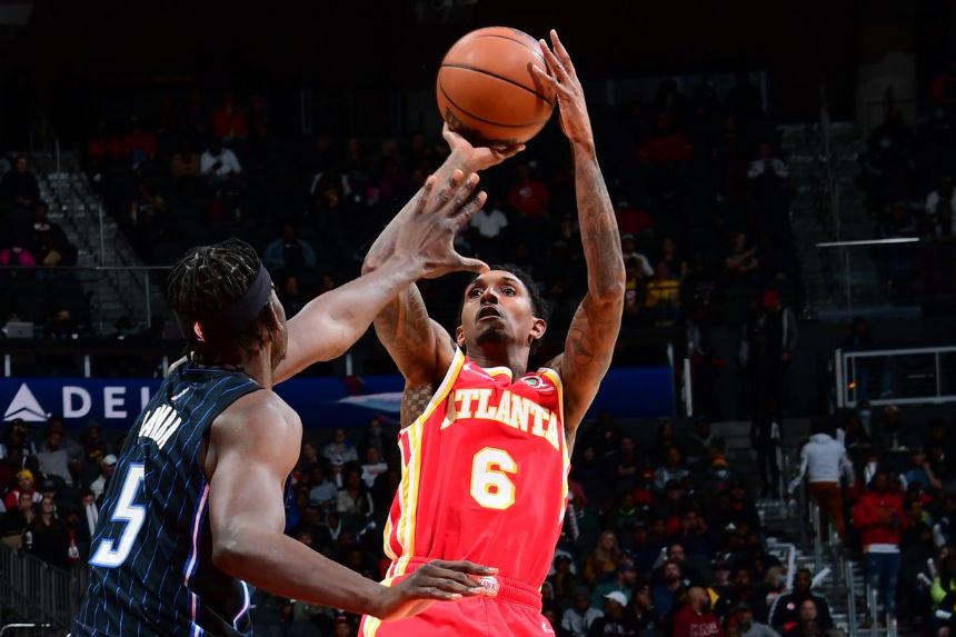 Young, Collins each score 23 as Hawks beat Magic 129-111