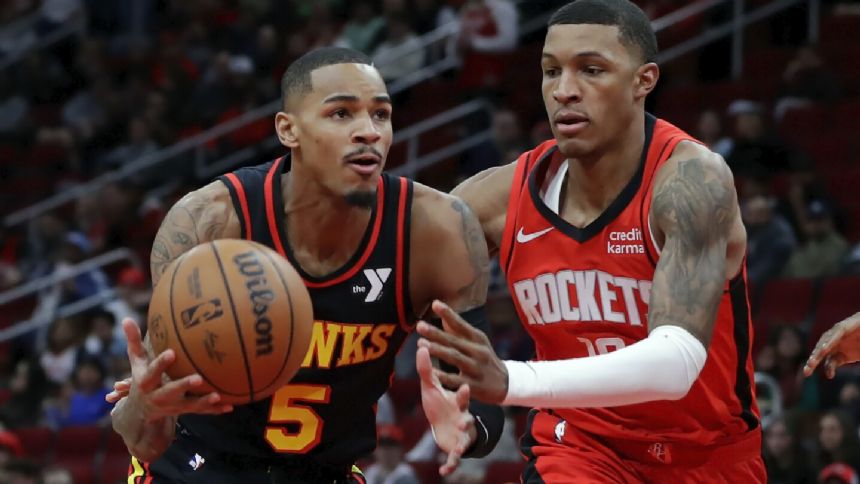 Young has 30 points, 14 assists as Hawks down Rockets 134-127