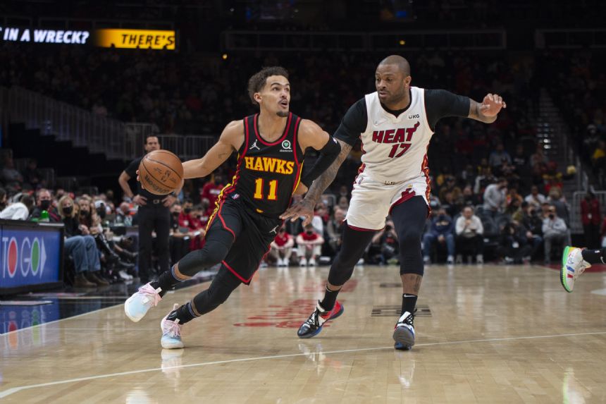Young scores 28 as Hawks hold Heat at the end, 110-108