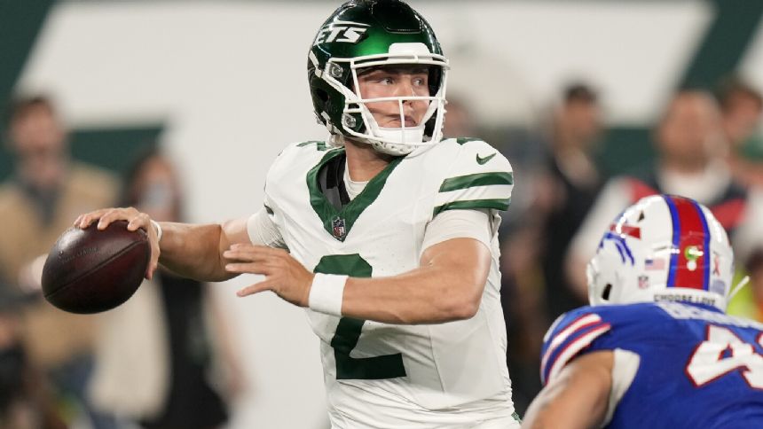 Zach Wilson steps into the huddle again for the Jets with Aaron Rodgers injured
