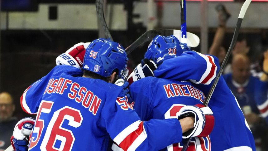 Zibanejad has 2 goals and 1 assist, Panarin scores as Rangers beat Hurricanes 4-3 in Game 1